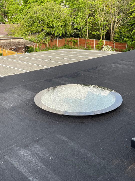 Round Skylight or Rooflight on a flat roof extension installed by Aiden Sheridan